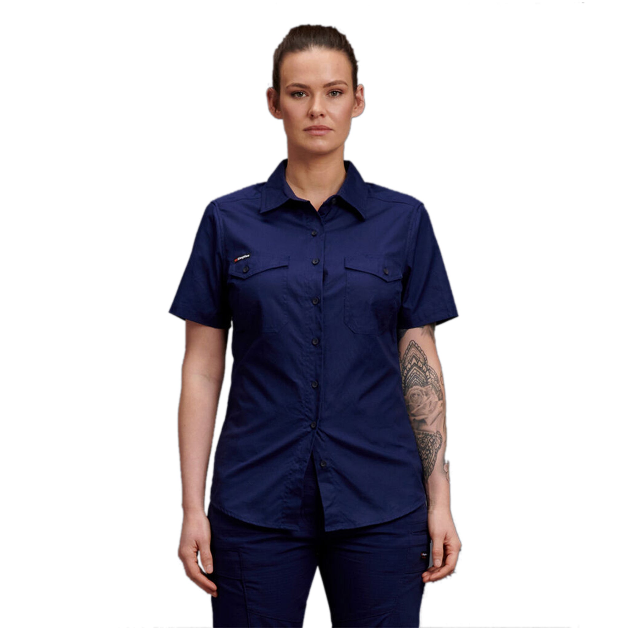 A woman wearing navy KingGee short sleeve workcool shirt