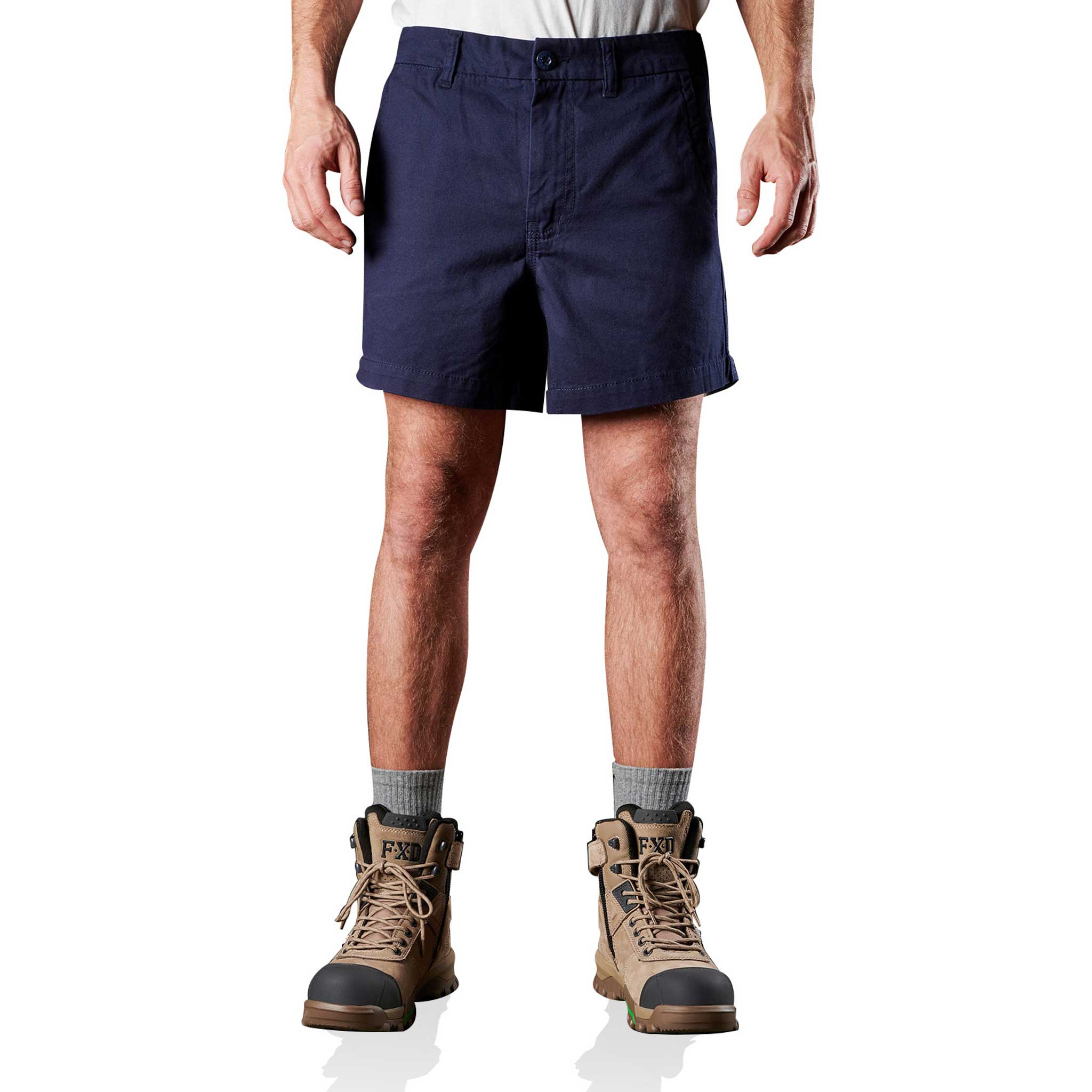 A man wearing FXD Cotton Twill pockets work short in navy