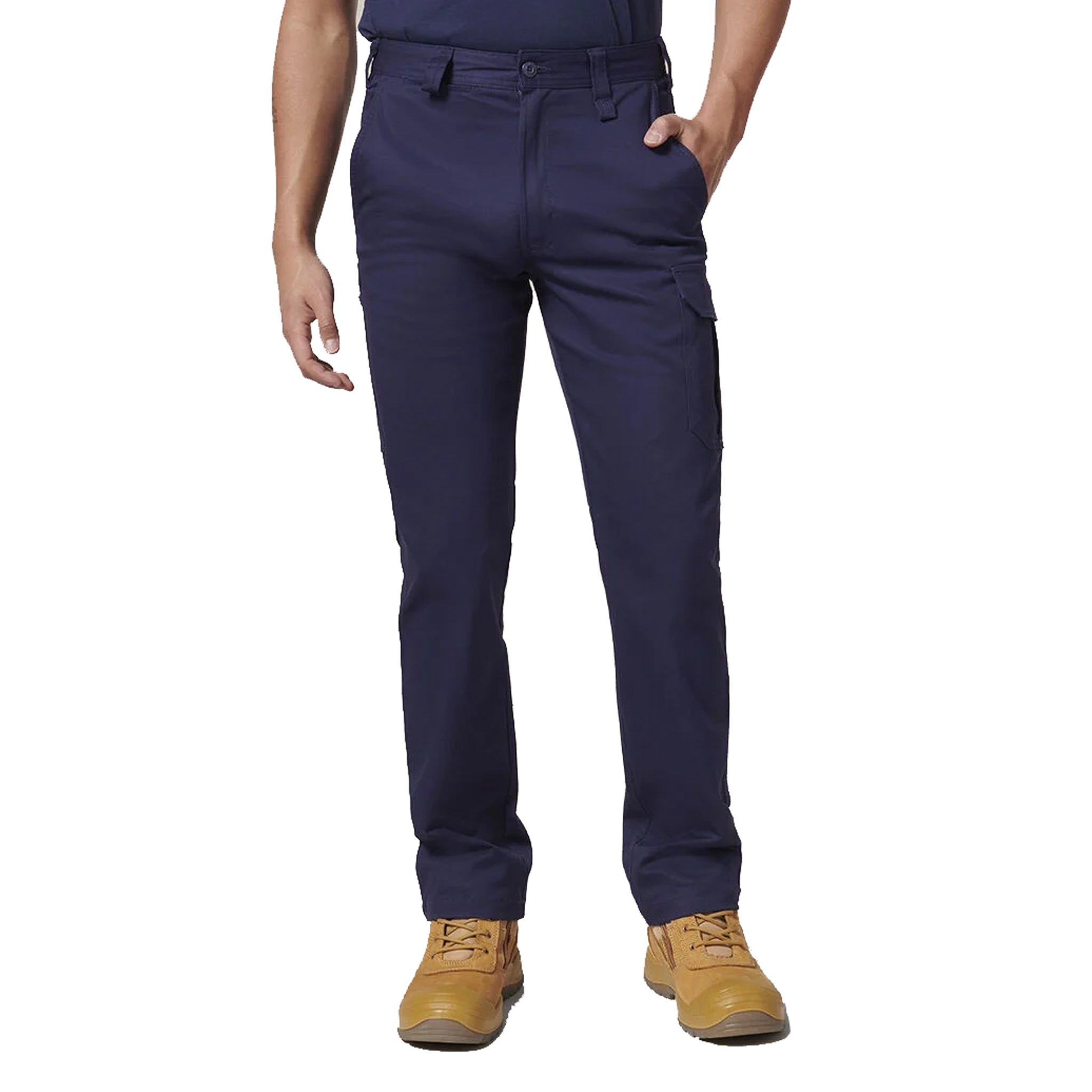 A man wearing navy blue cargo pants and tan boots.