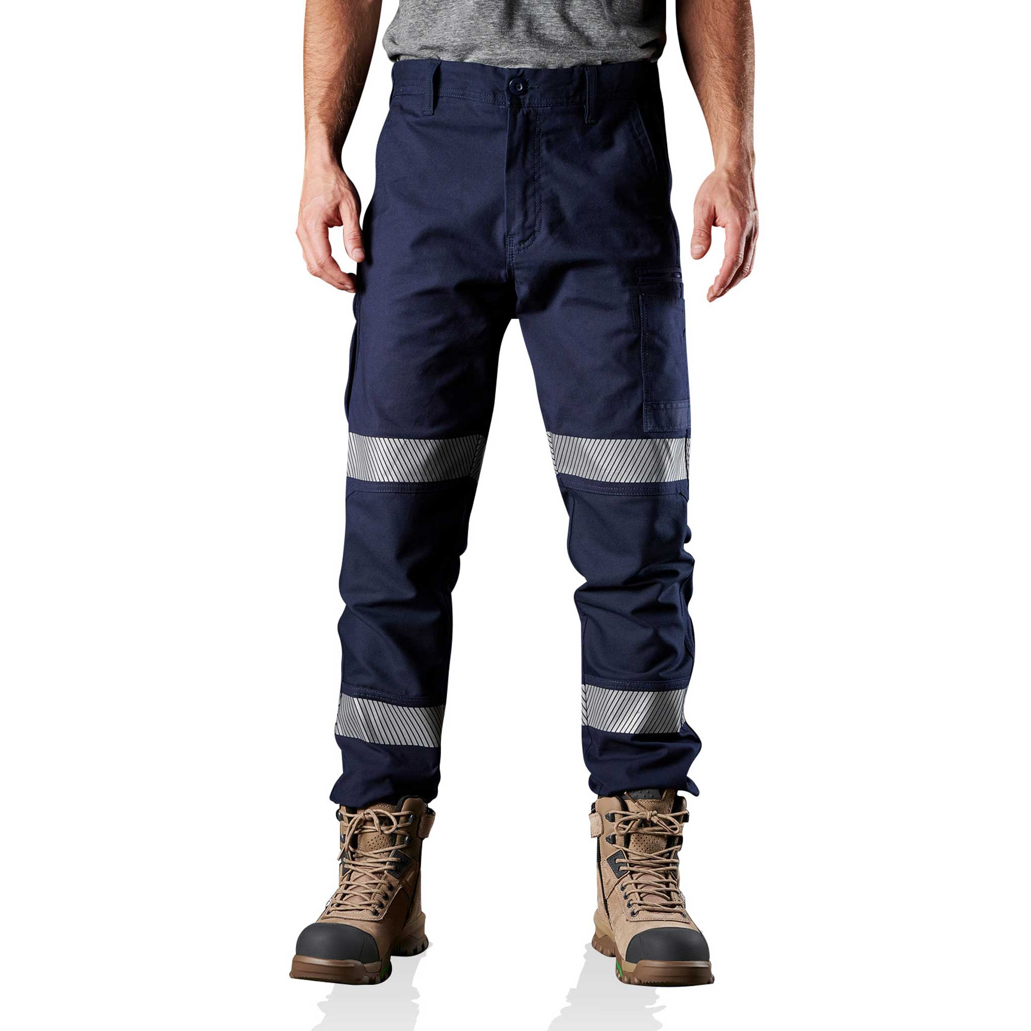 Person in navy blue work pants with white reflective stripes.