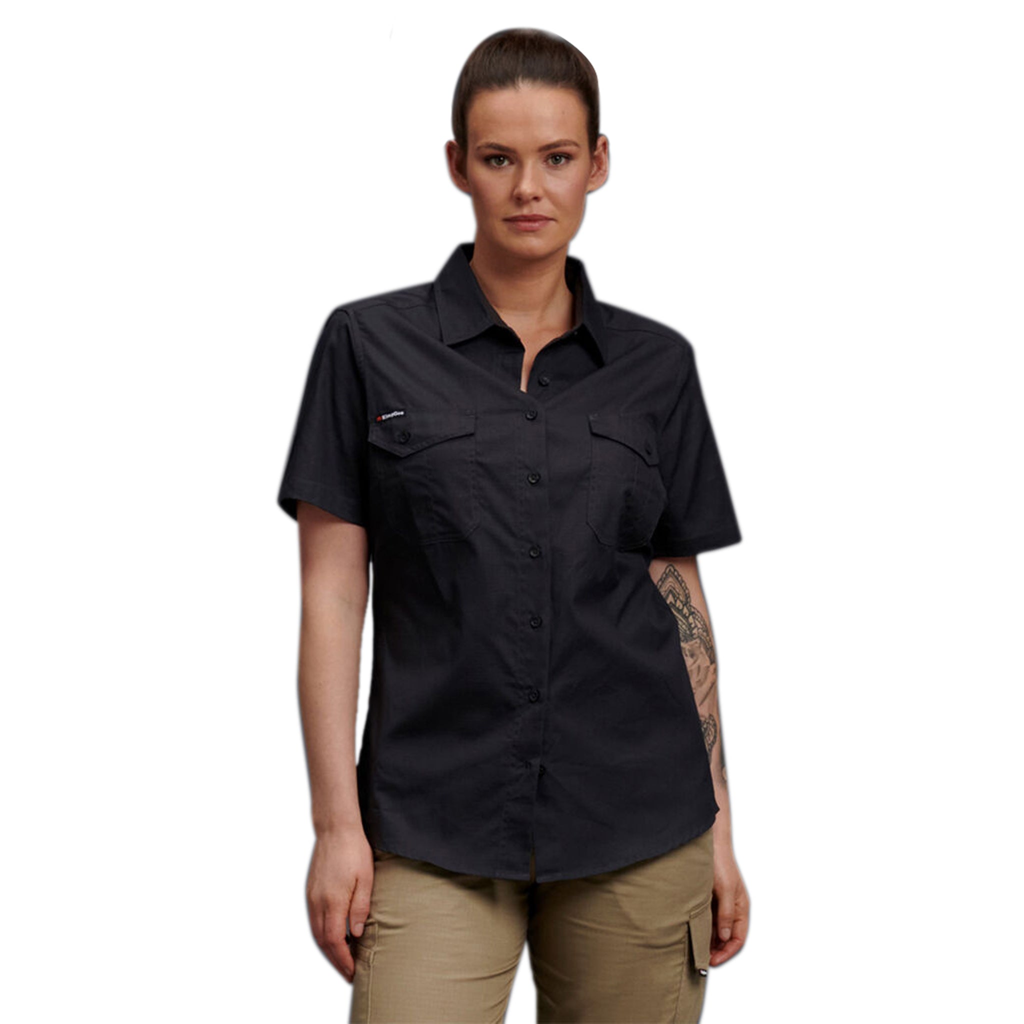 A woman wearing charcoal KingGee short sleeve workcool shirt