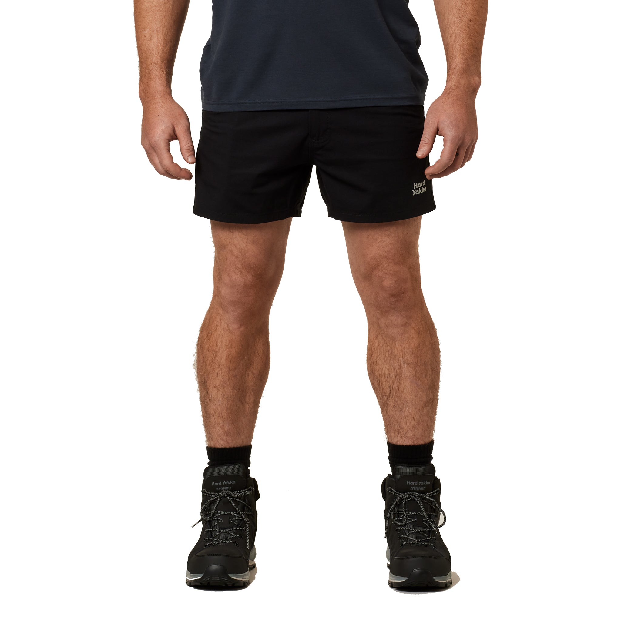 high cut black work shorts with hard yakka logo on one leg. great for keeping cool on the job