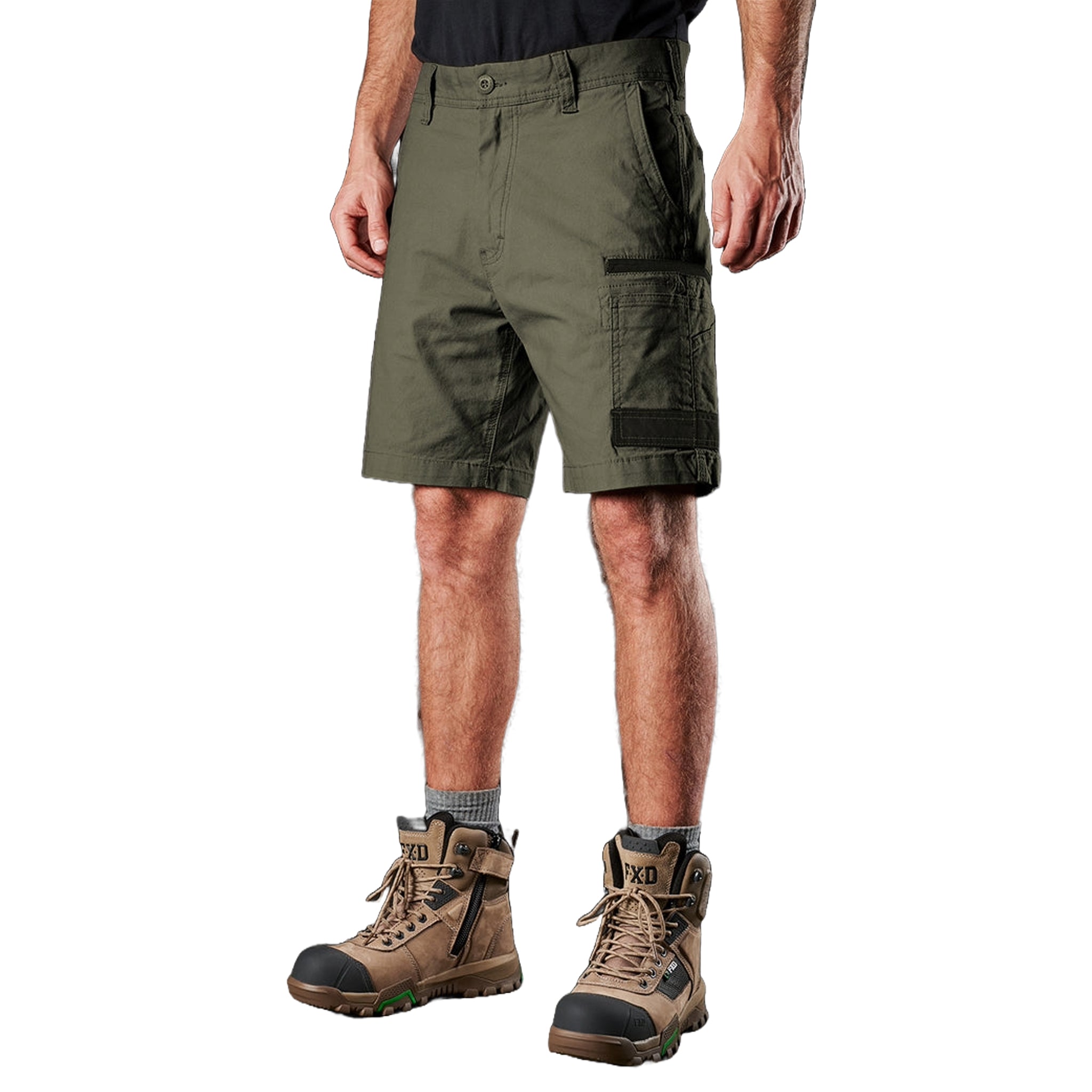 A man wearing FXD Stretch Canvas pockets work shorts in green