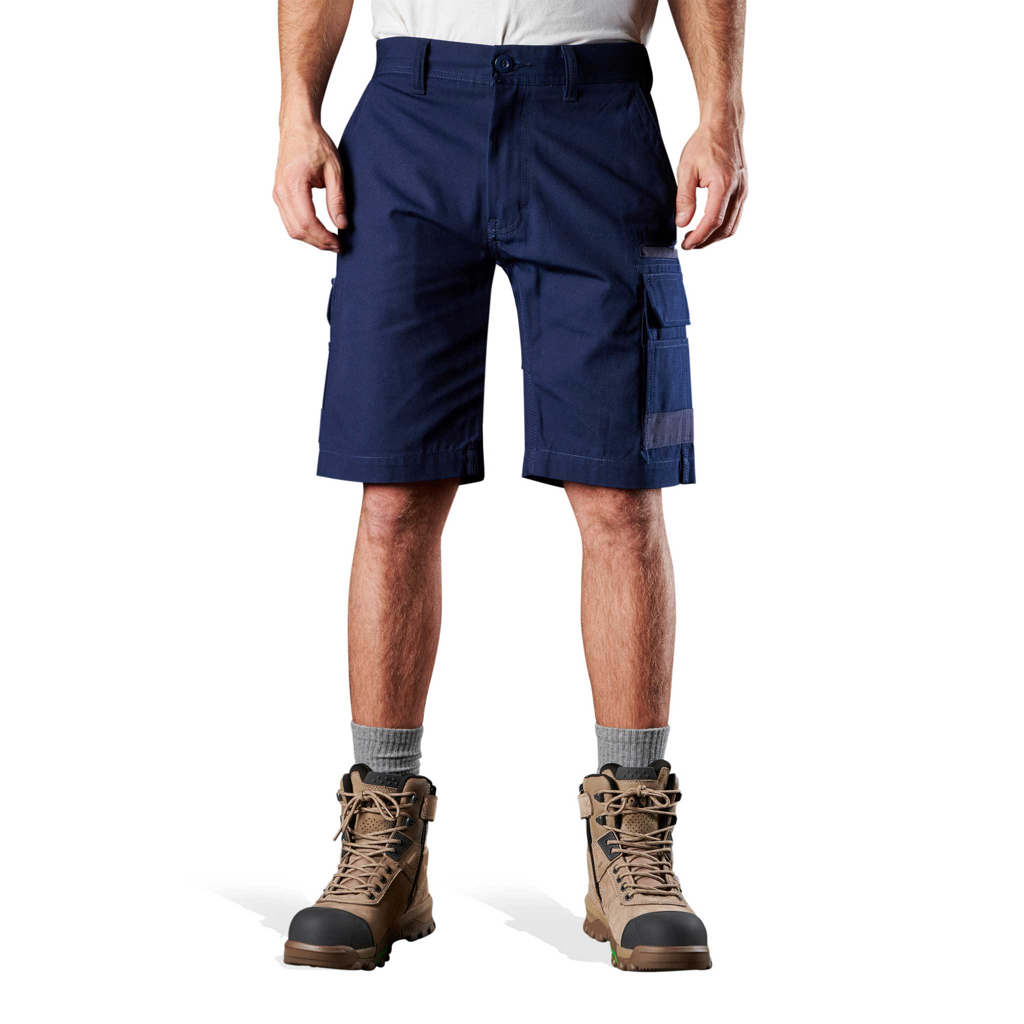 A man wearing FXD Cotton Canvas pockets work shorts in navy