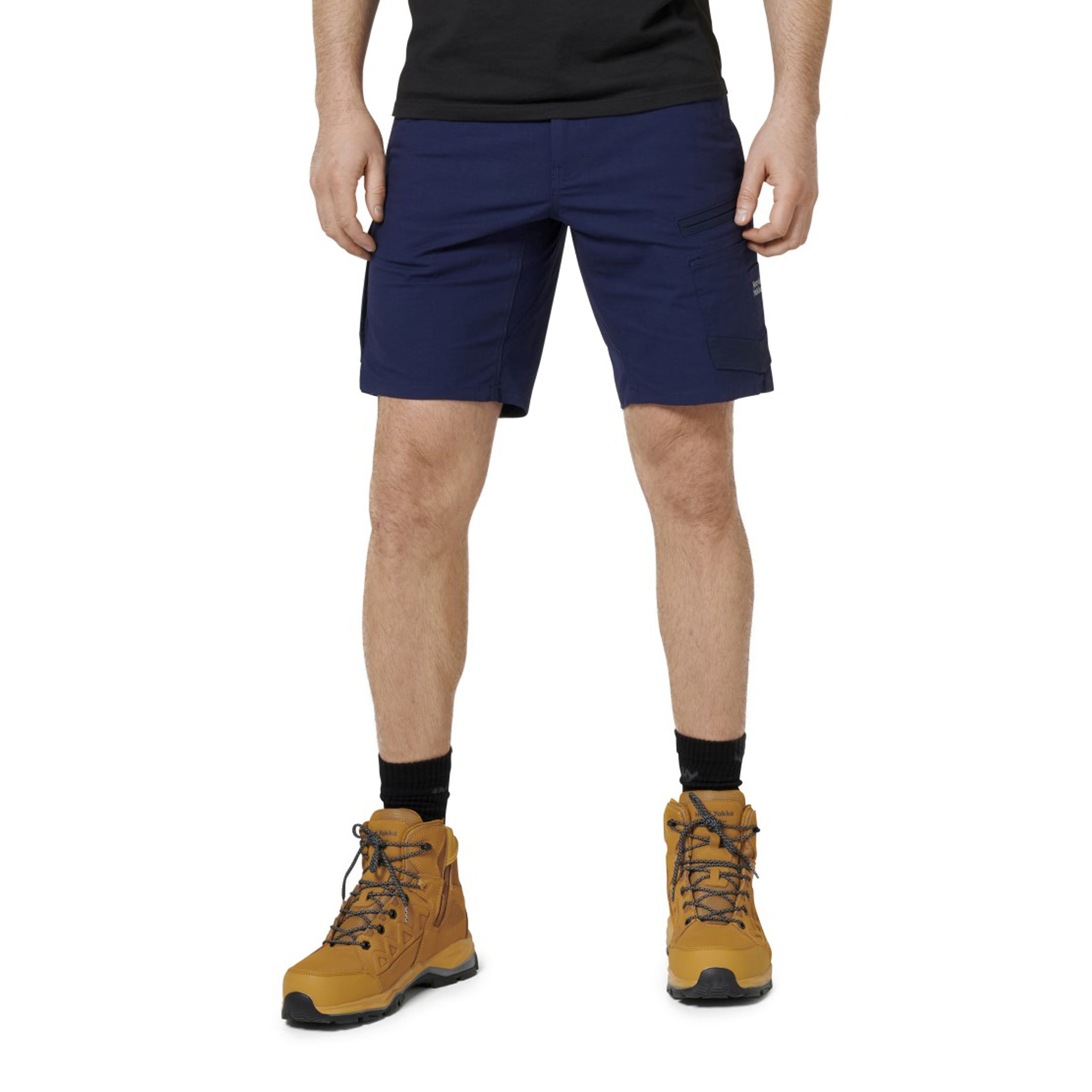 relaxed cut navy blue work shorts that end above the knee, with large pockets and hard yakka logo