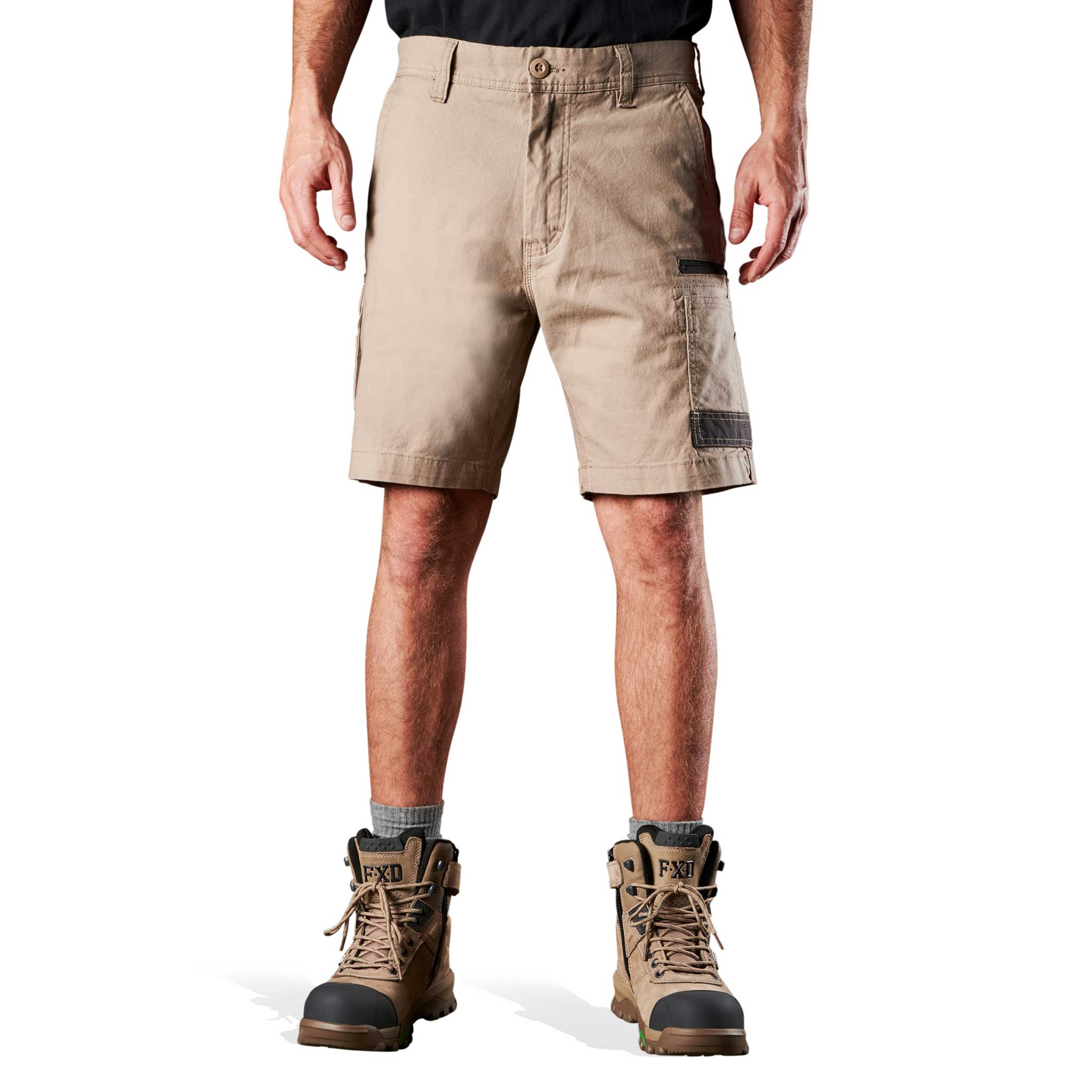 A man wearing FXD Stretch Canvas pockets work shorts in khaki