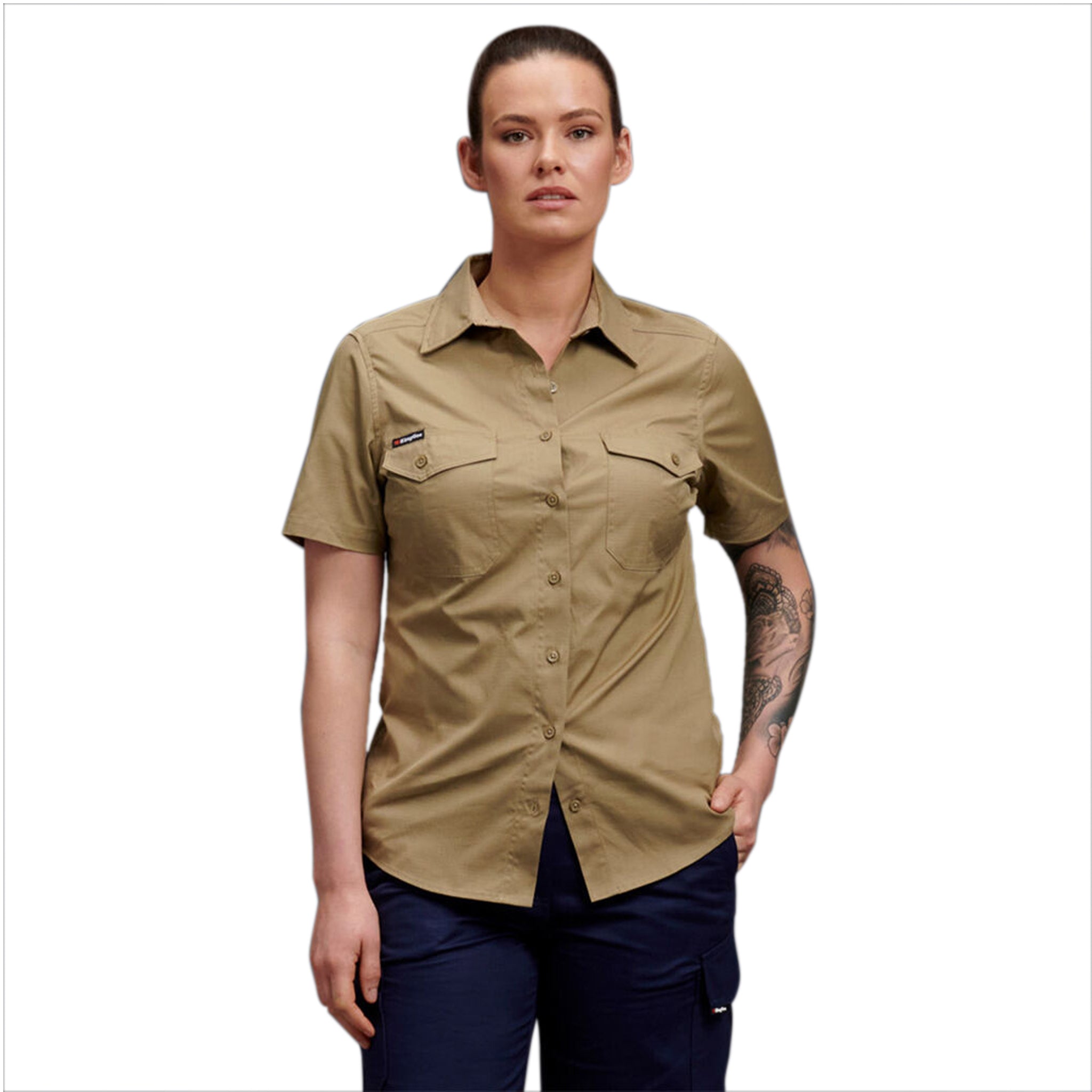 A woman wearing khaki KingGee short sleeve workcool shirt