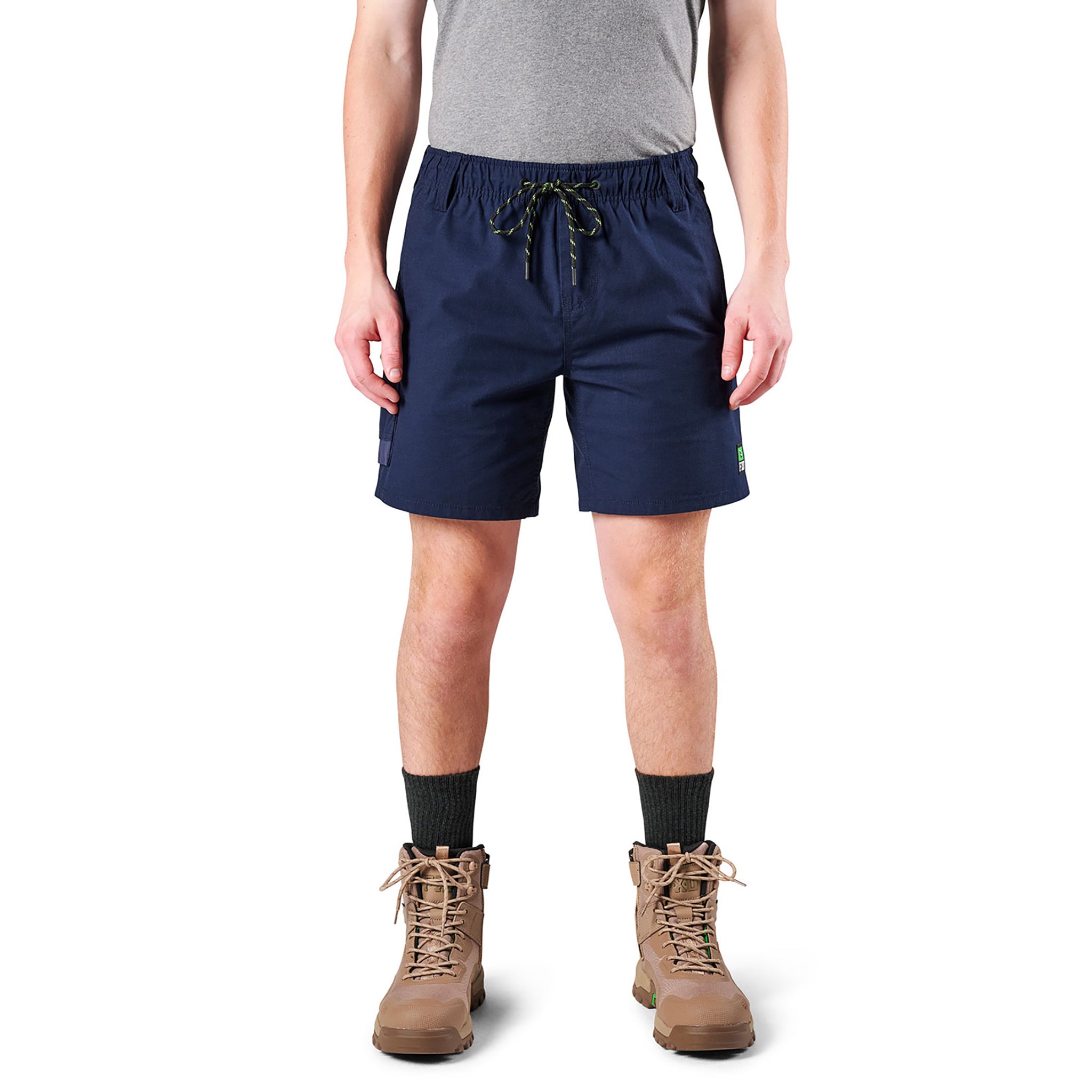 A person wearing a navy blue, high-visibility work shirt with reflective stripes.