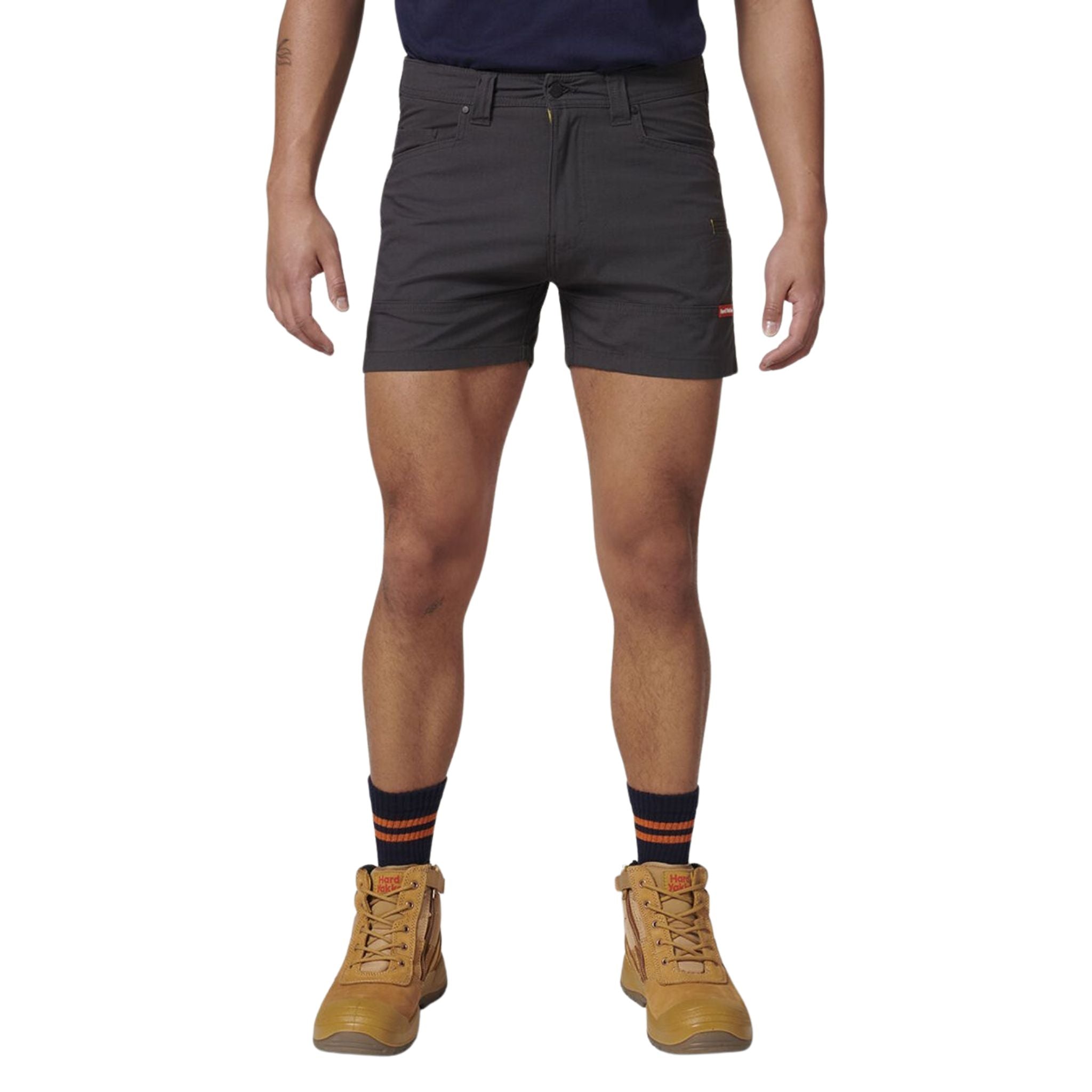 A man wearing Hard Yakka Ripstop short short in charcoal