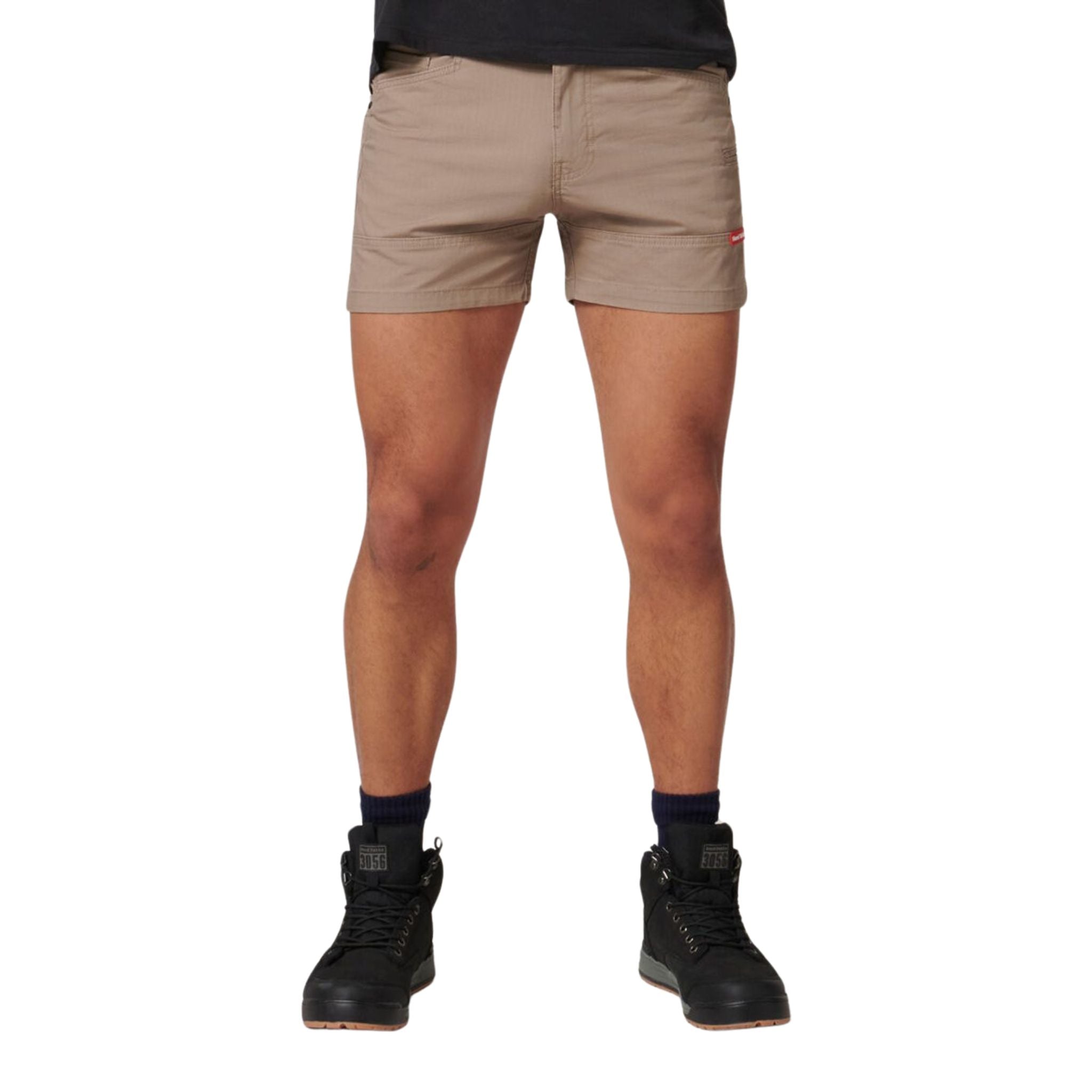 A man wearing Hard Yakka Ripstop short short in desert
